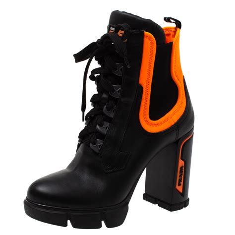 prada boots black and orange|prada black aftershave boots.